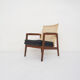 Fauteuil à dossier bas en rotin et cuir par P.J. Muntendam pour Gebr. Jonkers, Pays-Bas, années 1950