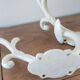 Hooks , bronze coat racks , white