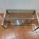Coffee table with stainless steel base and smoked glass, from the 70s