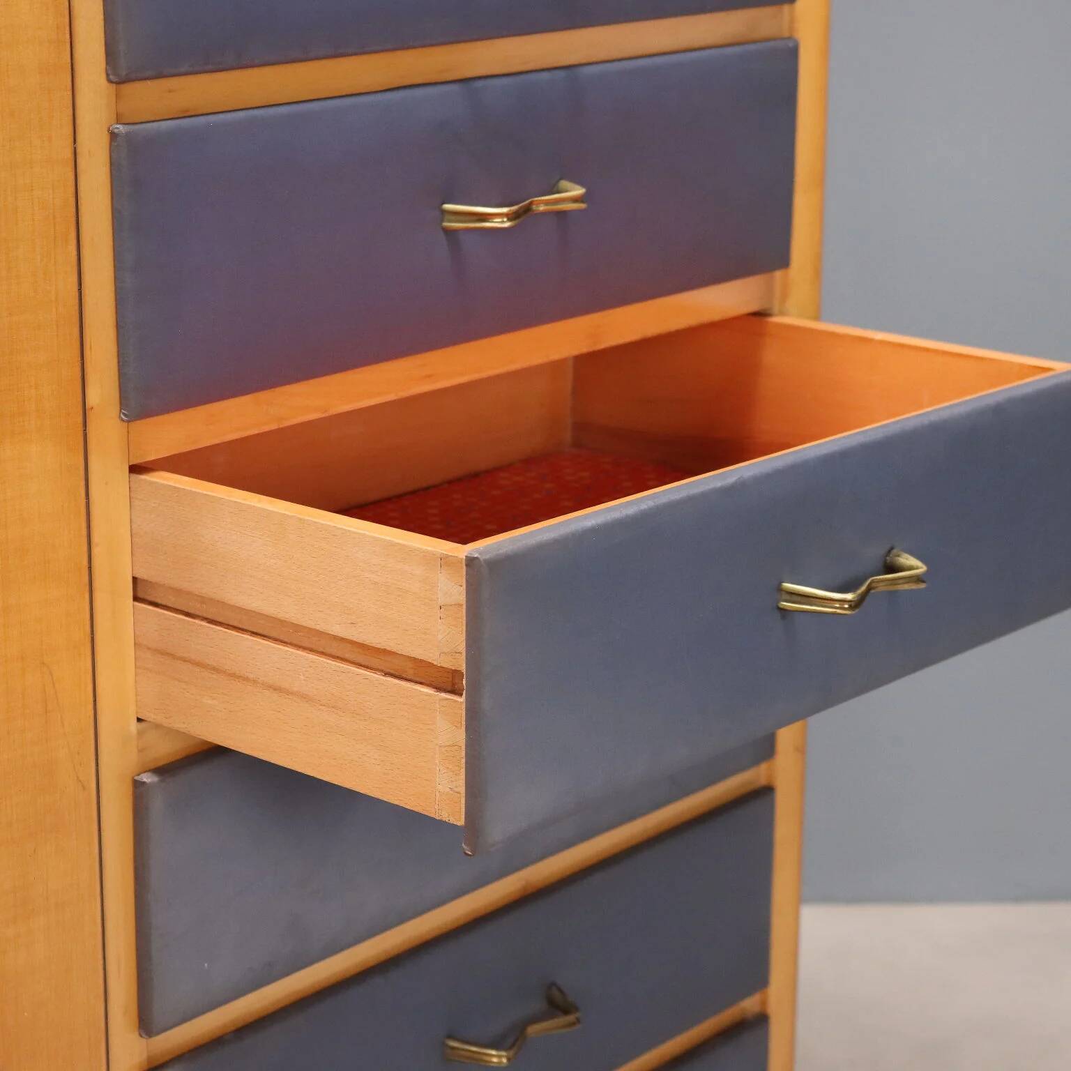 Vintage storage furniture in maple veneer with a glass top, Italian design 1950s.