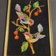 Vintage tapestry framed birds on black background
