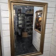 Golden mirror in oak from the 19th century.
