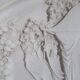Large Chinese resin dish, sculpted motifs, signed