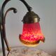 Brass articulated lamp with glass paste signed art of France.