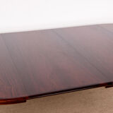 Danish extendable dining table in Rio Rosewood model 55 by Arne Vodder for Sibast 1958.