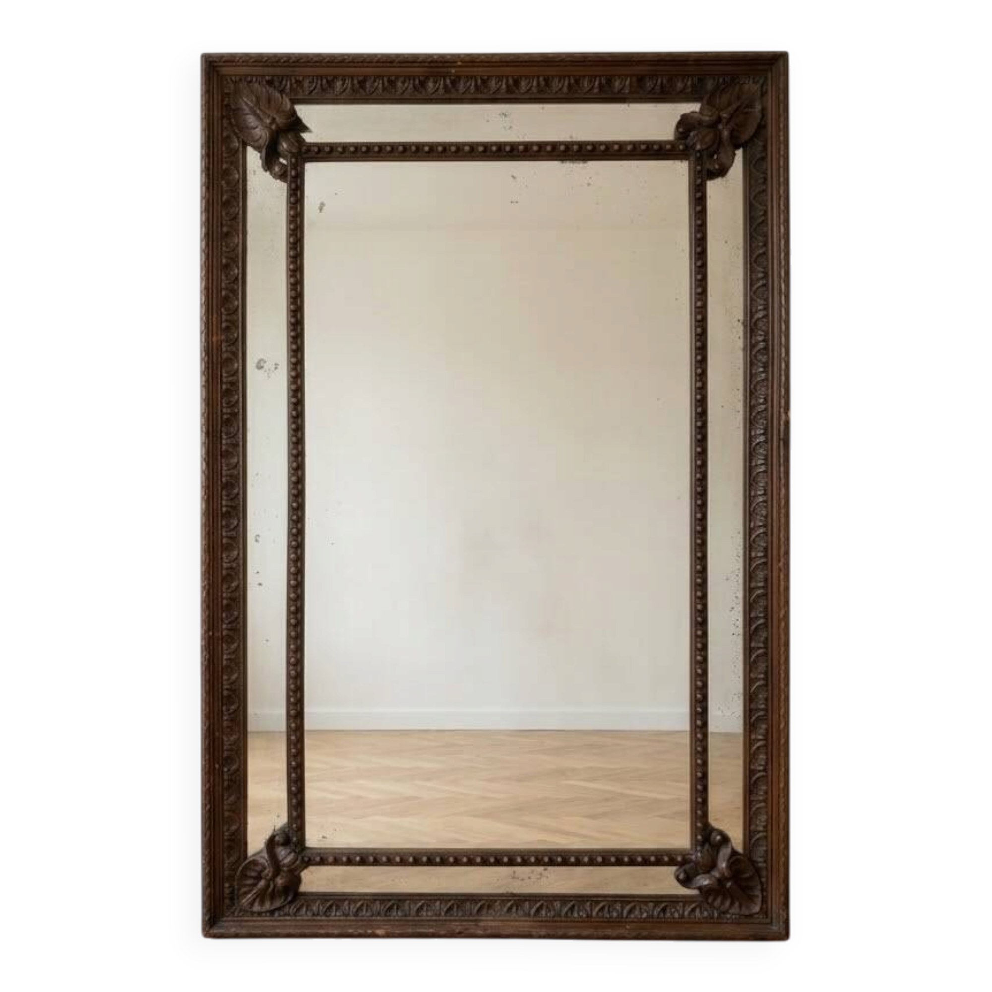 Large antique mirror in carved wood