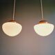 Duo of Art Deco suspensions in white opaline, 1920s-30s