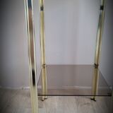 Golden side table and smoked glass