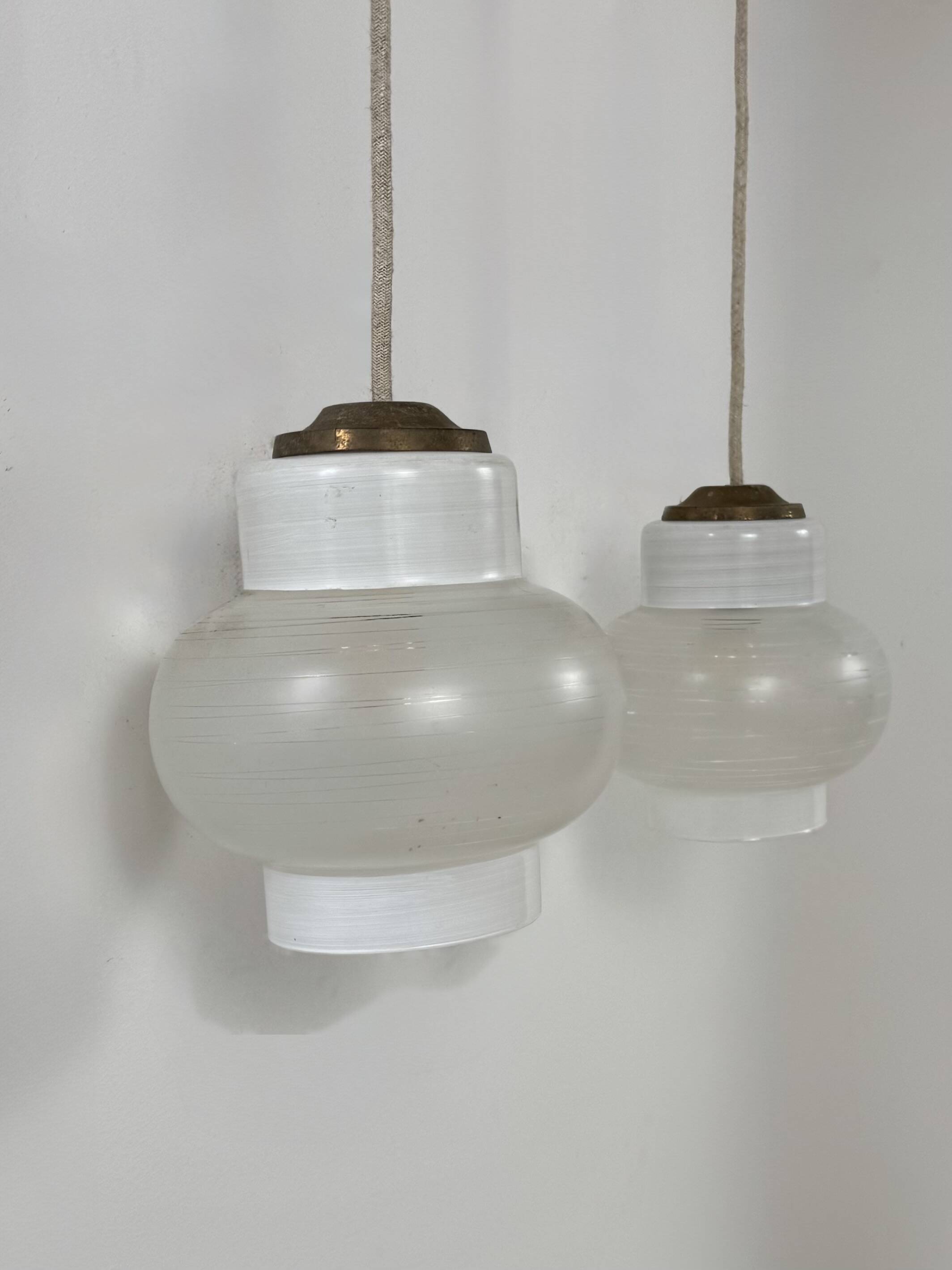 Pair of vintage pendant lights, blown white glass, France, 1970.