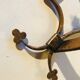 Paire d'appliques en métal doré à décor de trèfles