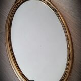 Oval golden mirror 41x23