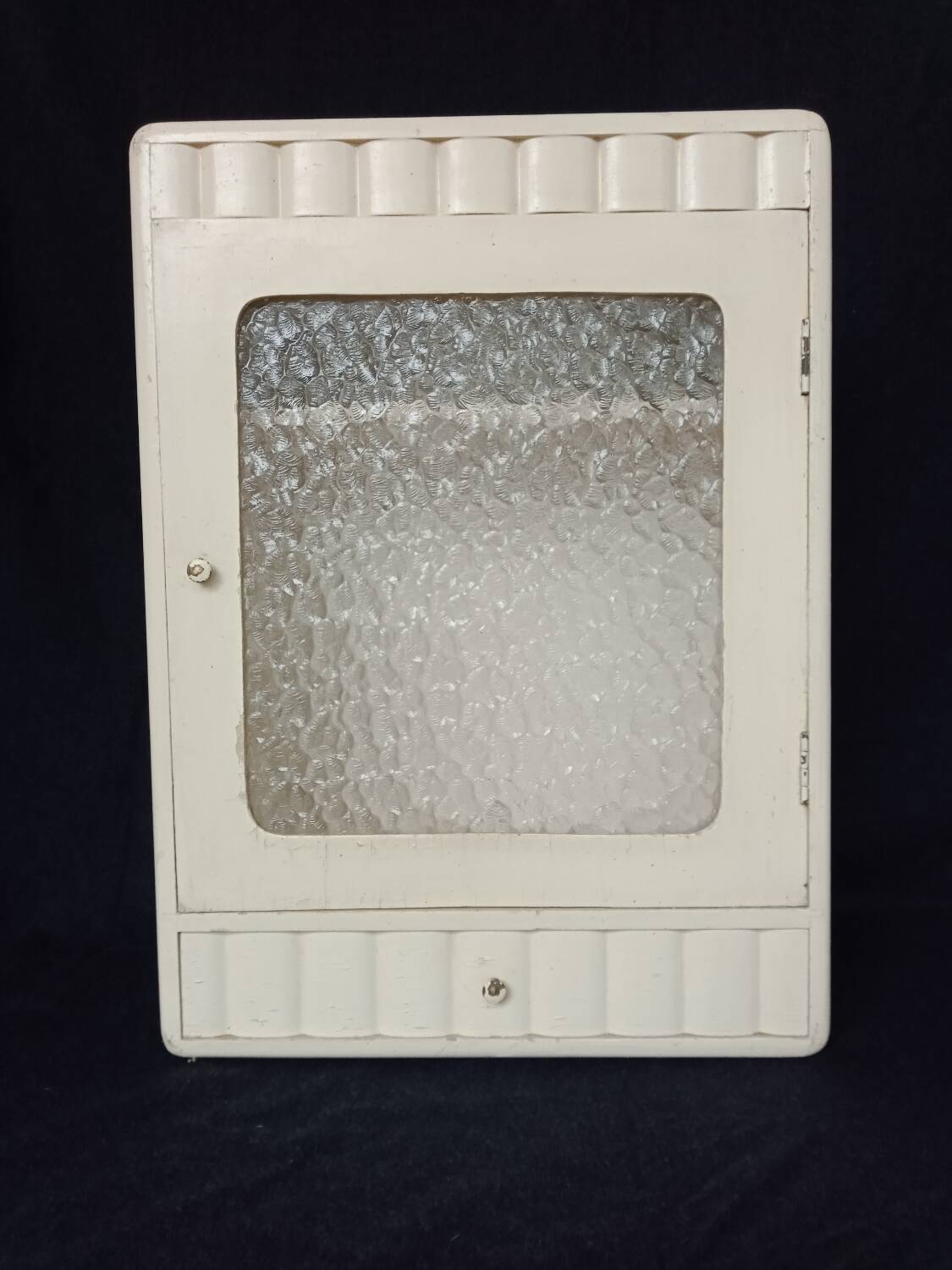 Old wall cabinet with one door and one drawer