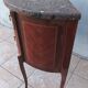 Half-moon commode in Louis XV style with walnut veneer.