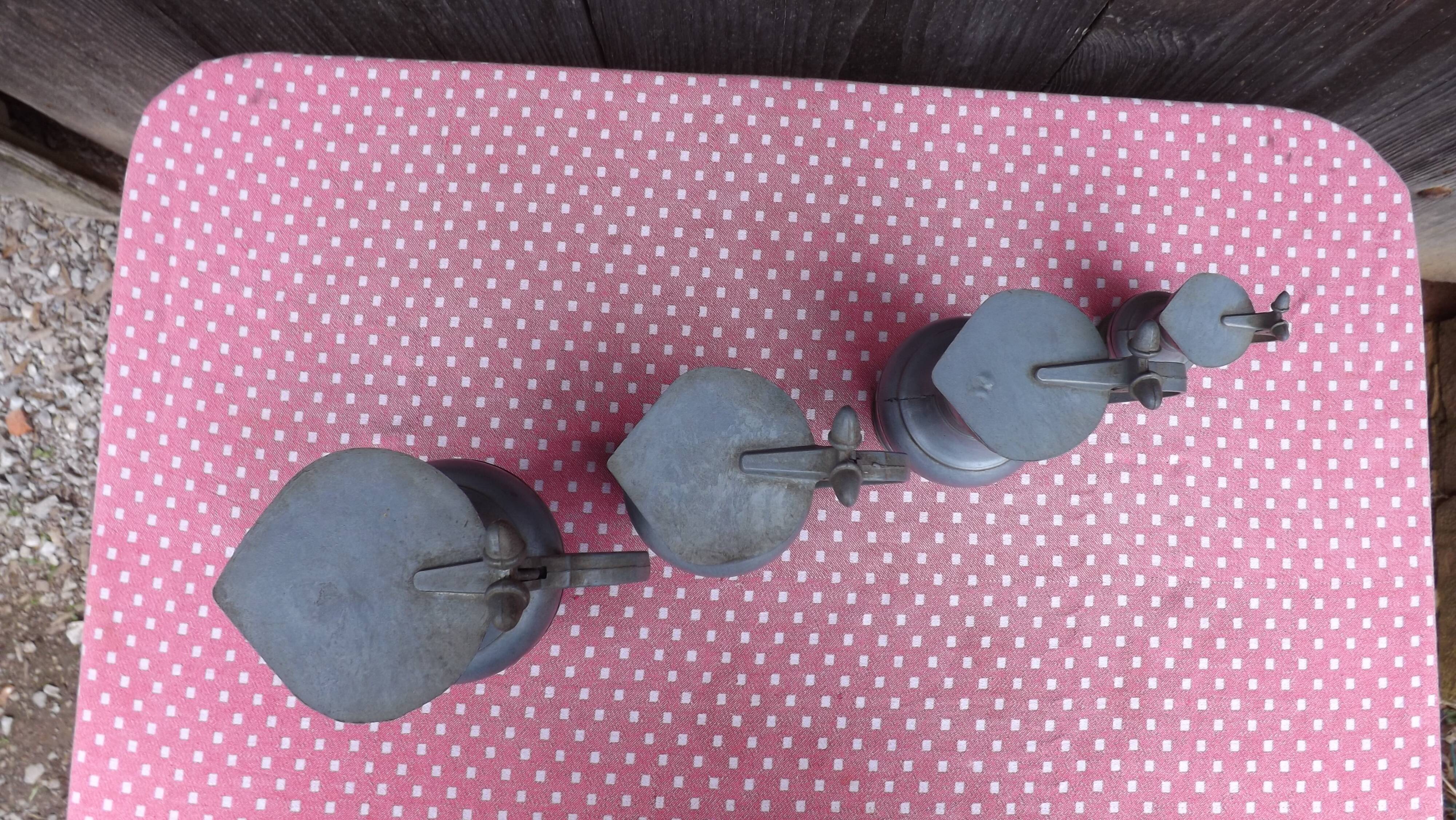 Lot of 4 tin pitchers