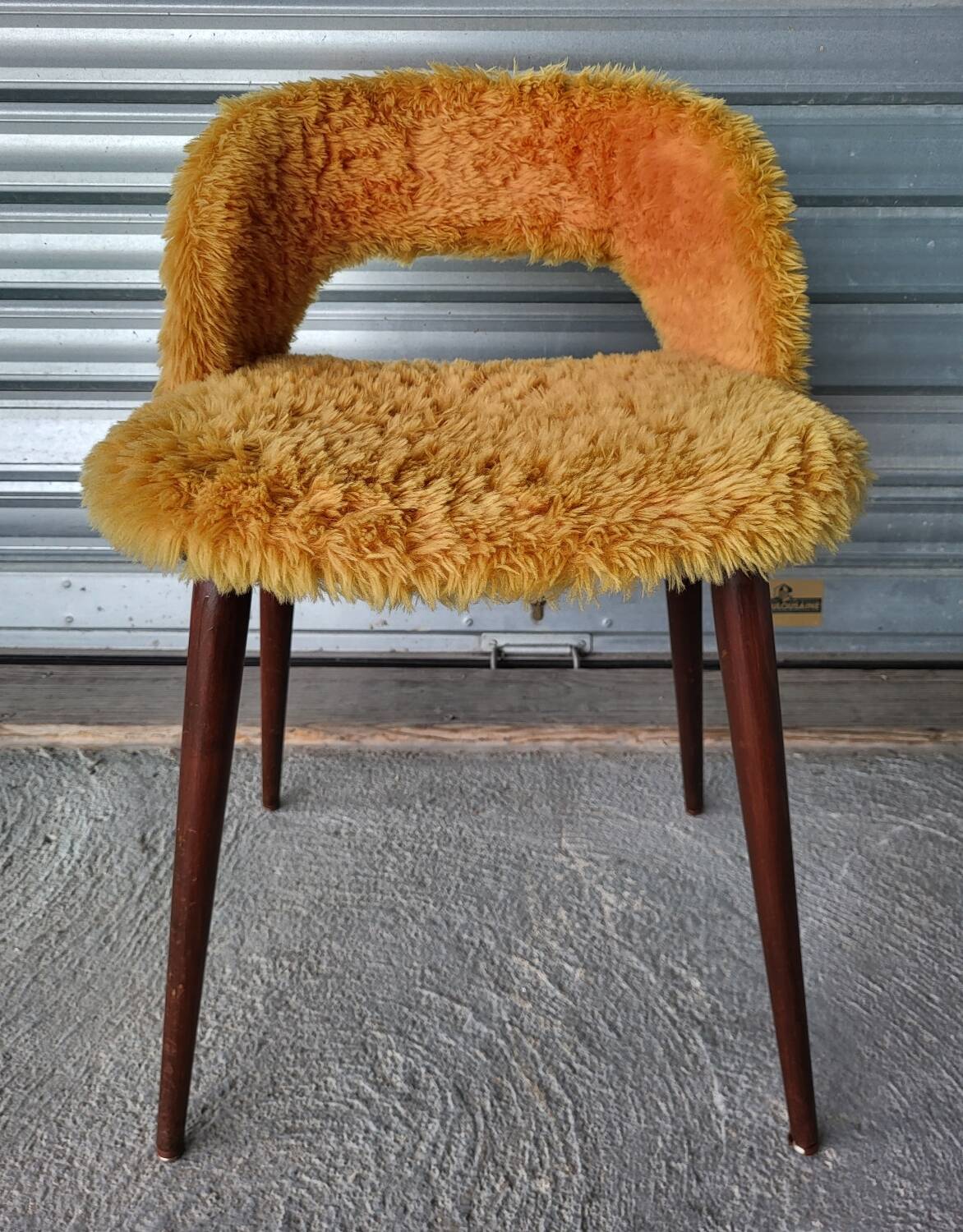 Authentic old vintage furry armchair in good condition