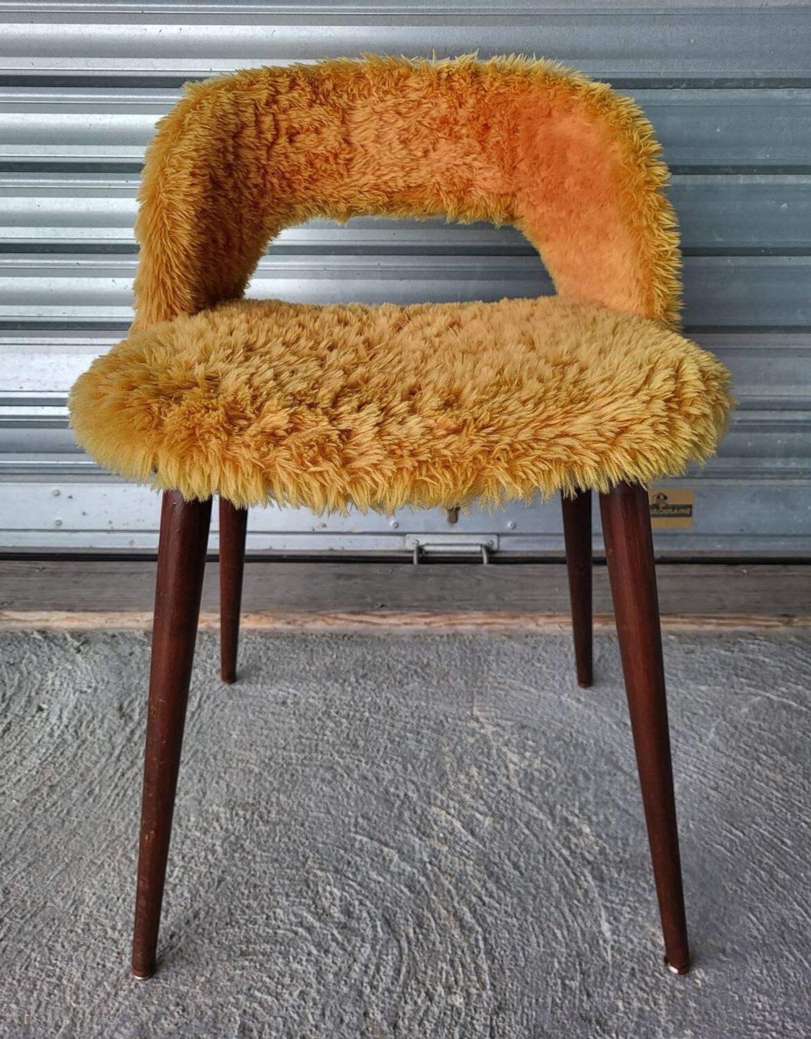 Authentic old vintage furry armchair in good condition