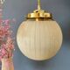 Vintage art deco globe pendant light in yellow and gold granite glass