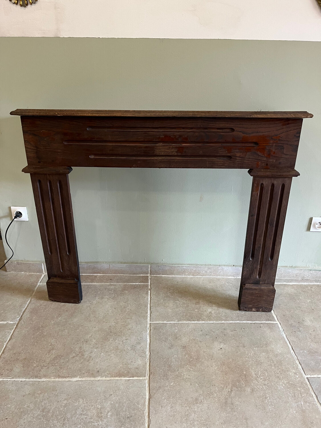 Antique wooden fireplace mantel