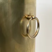 Cylindrical Brass Umbrella Stand with Ring Handles and Claw Feet.