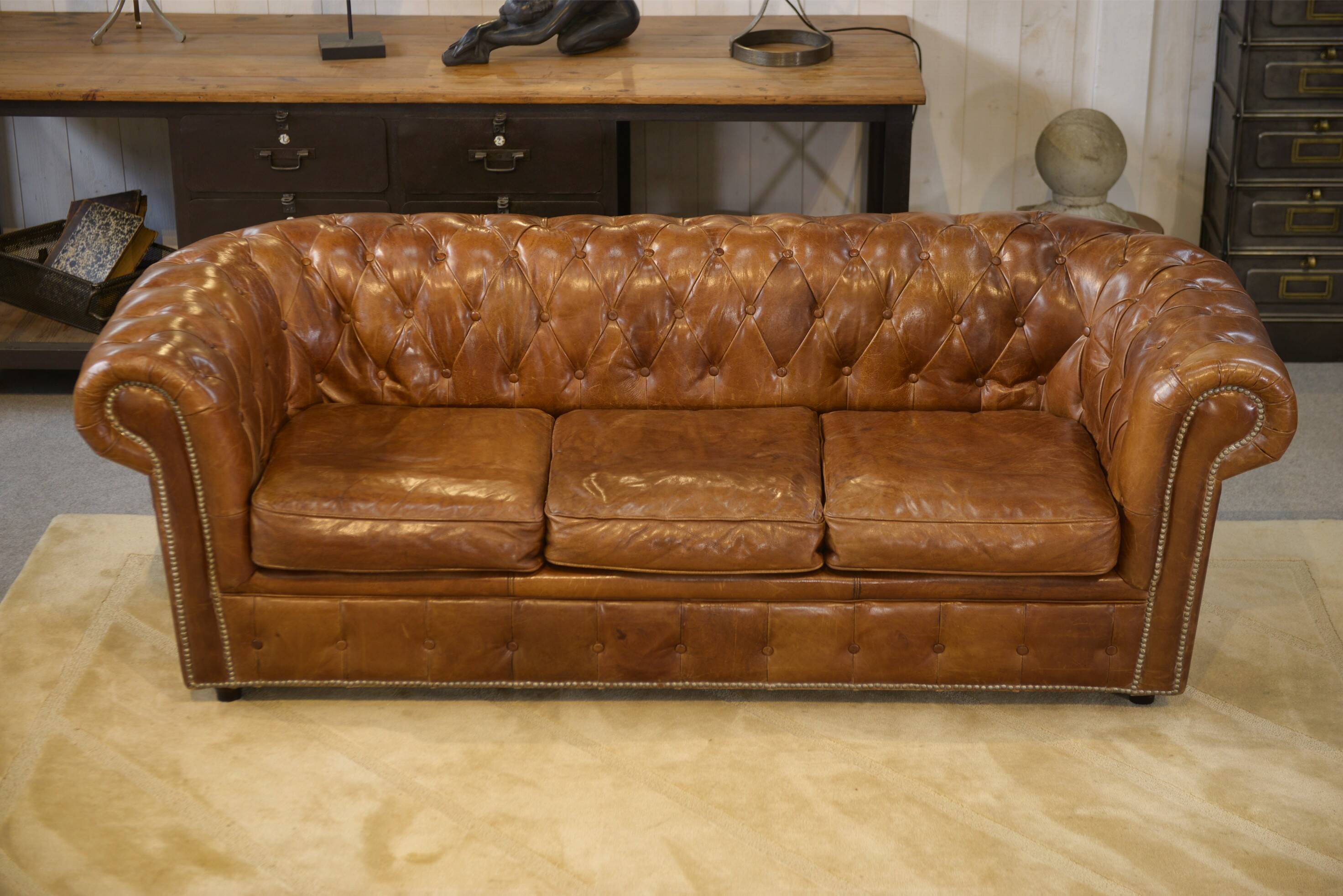 Brown leather Chesterfield sofa