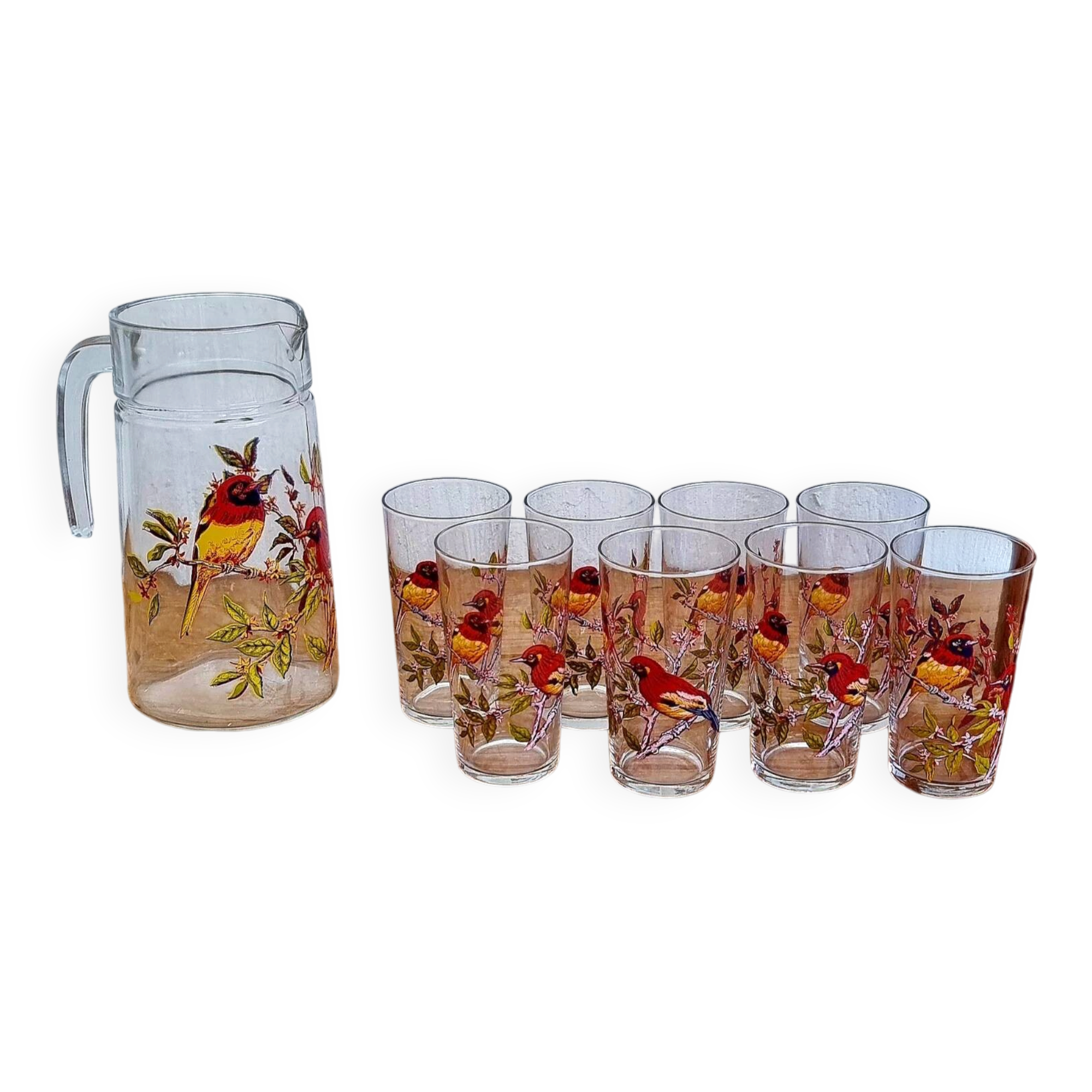 Vintage 1970s orangeade set with bird decoration.