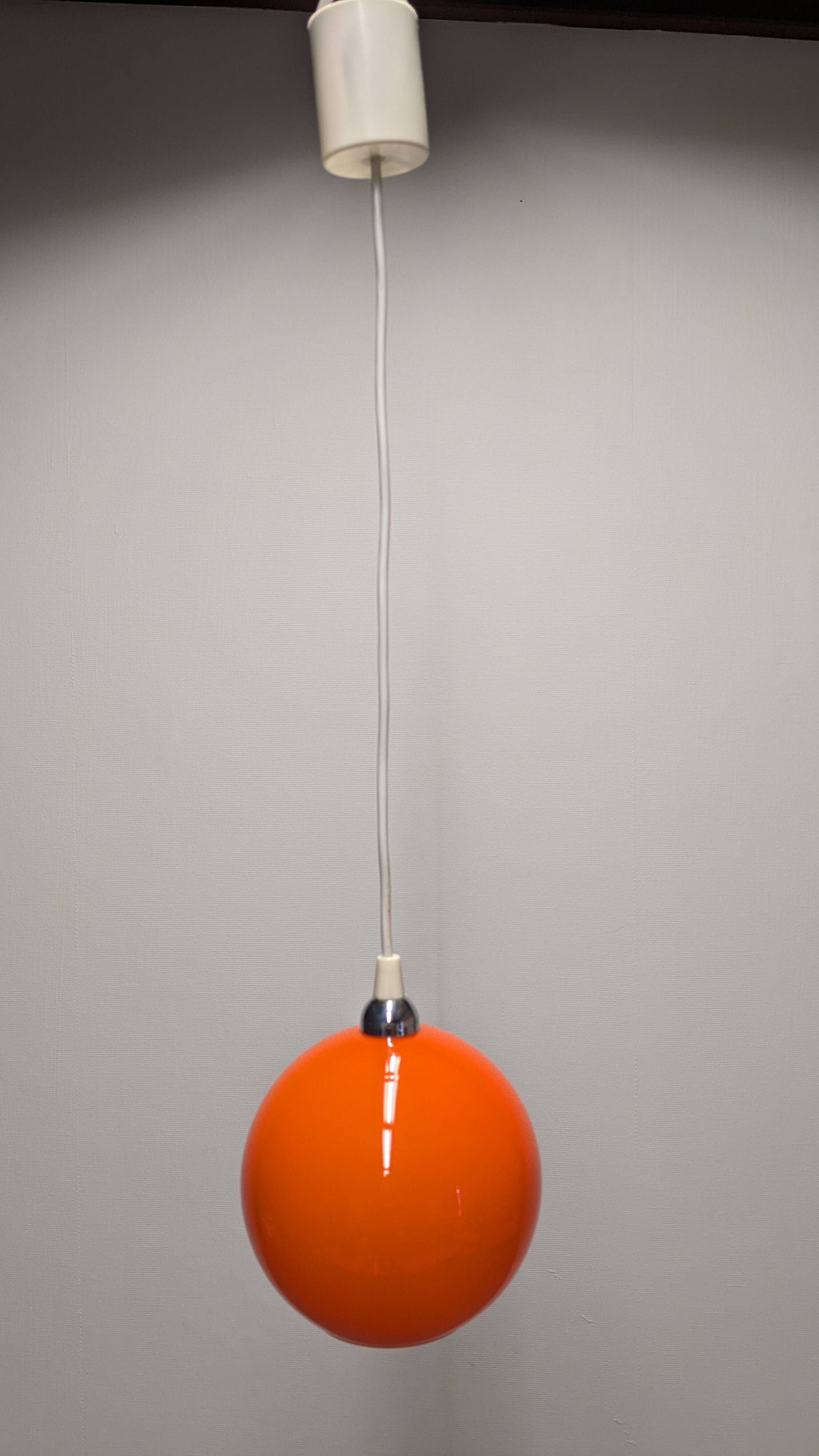Orange opaline ball pendant light, 1960s-70s