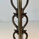 Pair of Brass and Wrought Iron Chenets with Scroll Columns and Arched Bases