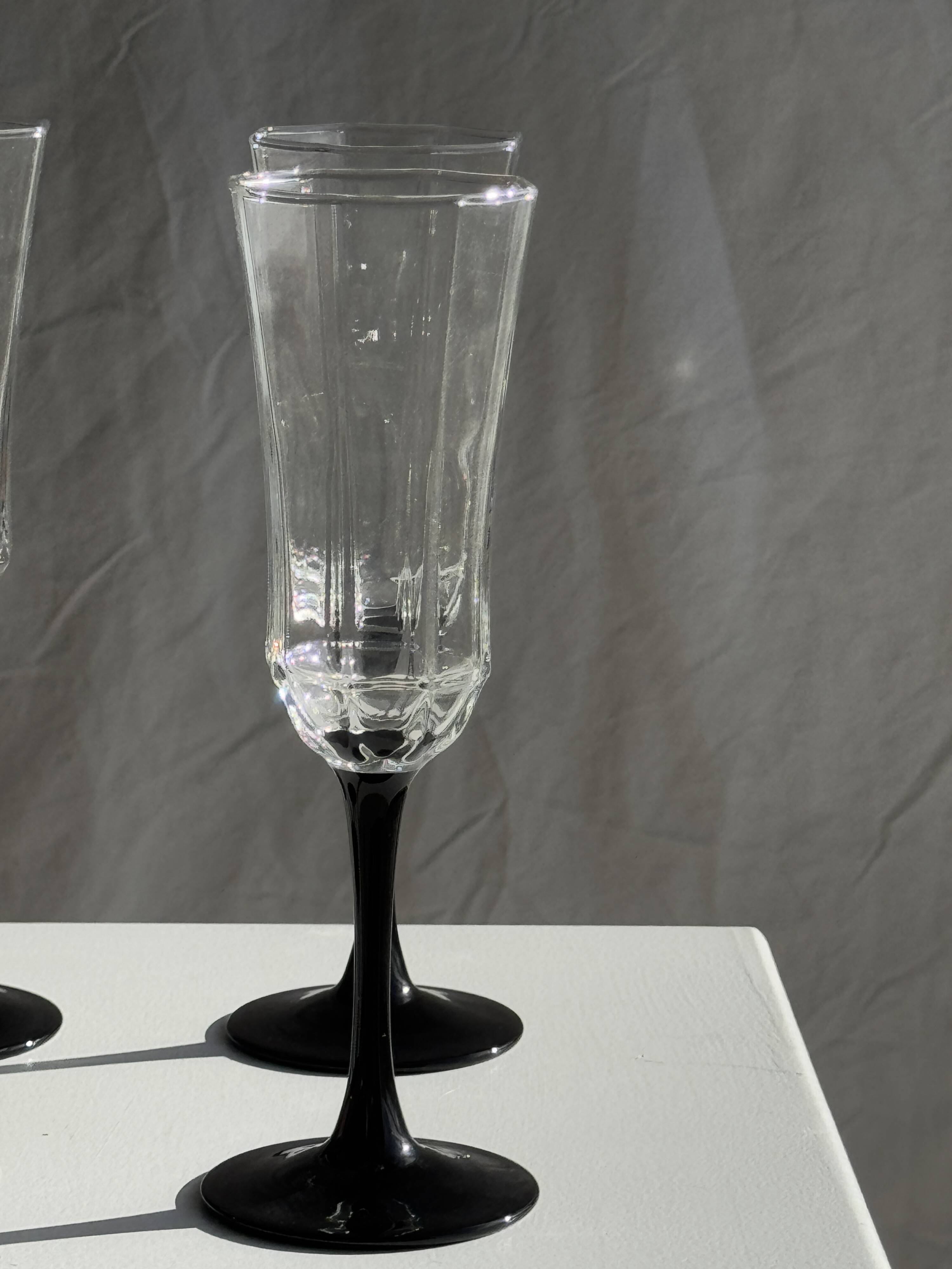 4 large Luminarc Octime vintage octagonal champagne flutes with black foot