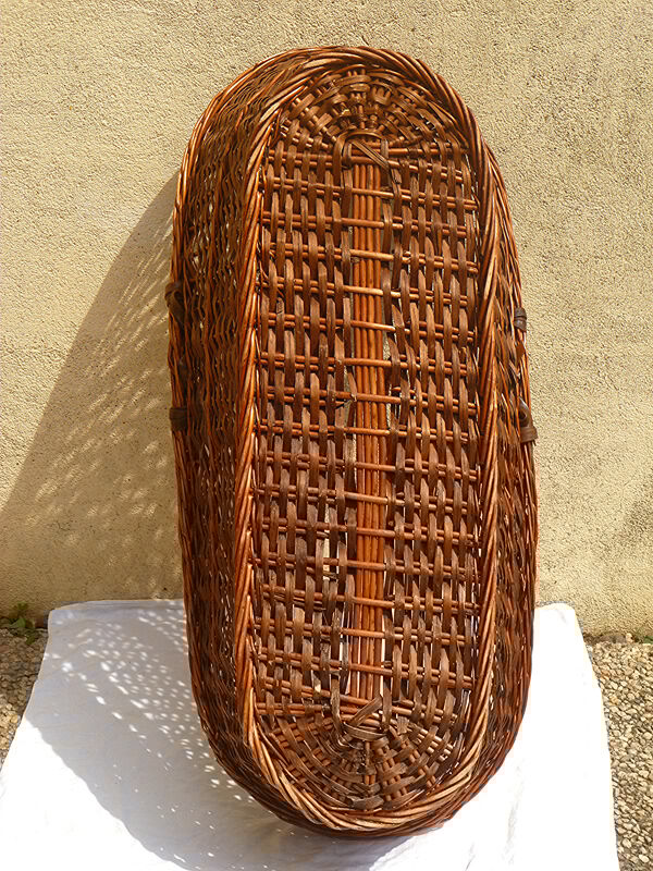 Old braided wicker couffin