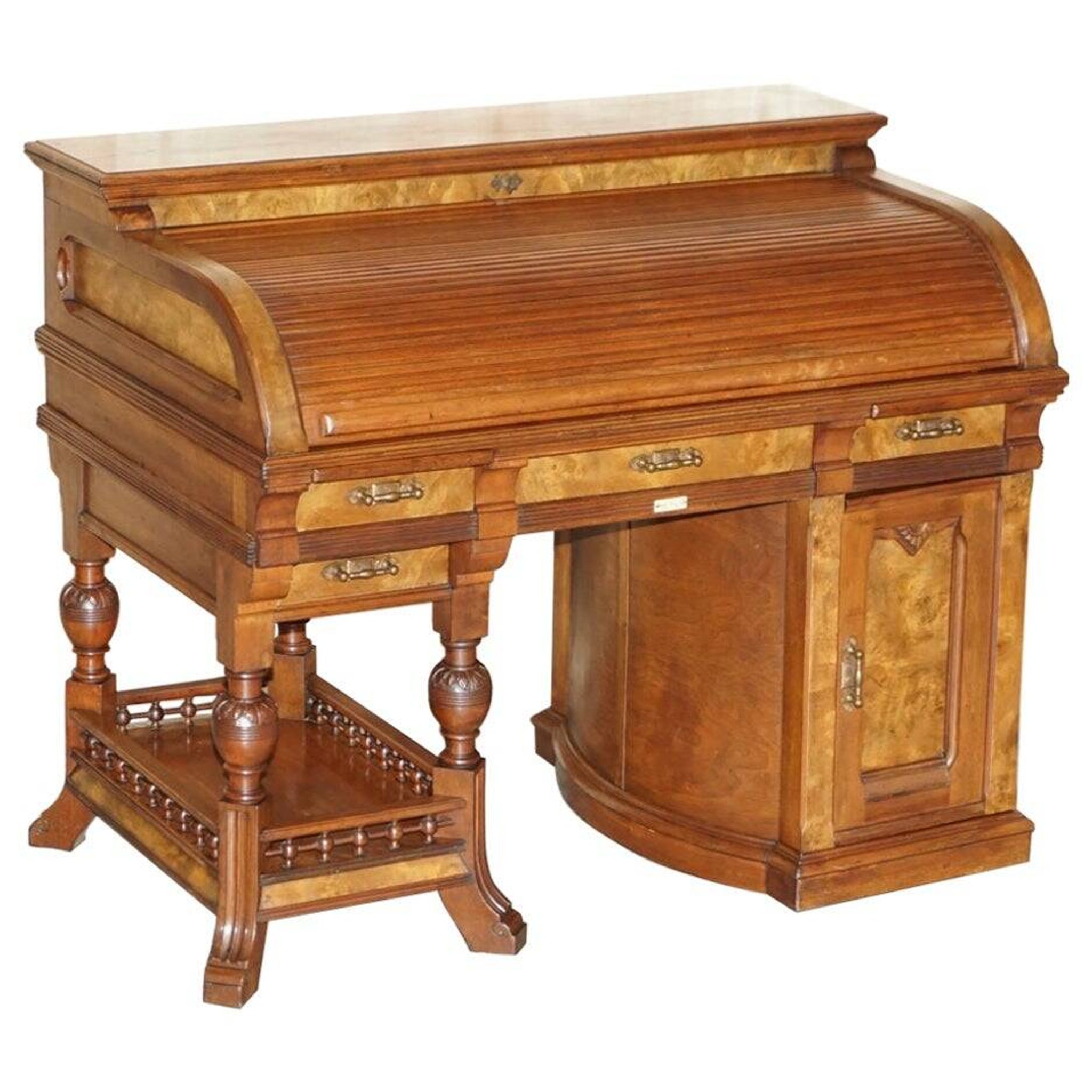 Shannon File Co drum desk in Victorian walnut with certificate.