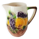 St-Clément pitcher in slip, fruit decoration