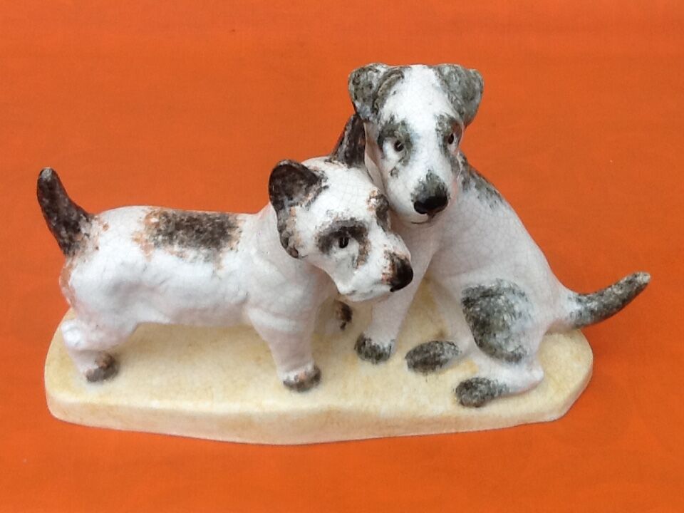 Zoomorphic sculpture cracked ceramic fox terrier dogs