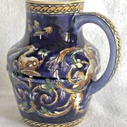 Old cream jug Gien Renaissance blue background 1938/1960
