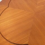 Vintage English round teak coffee table from the 1960s