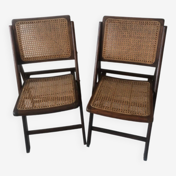 Pair of folding chairs in cane and dark wood
