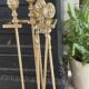 Brass fireplace tools in the style of Maison Baguès.