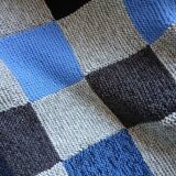 Hand knitted patchwork plaid