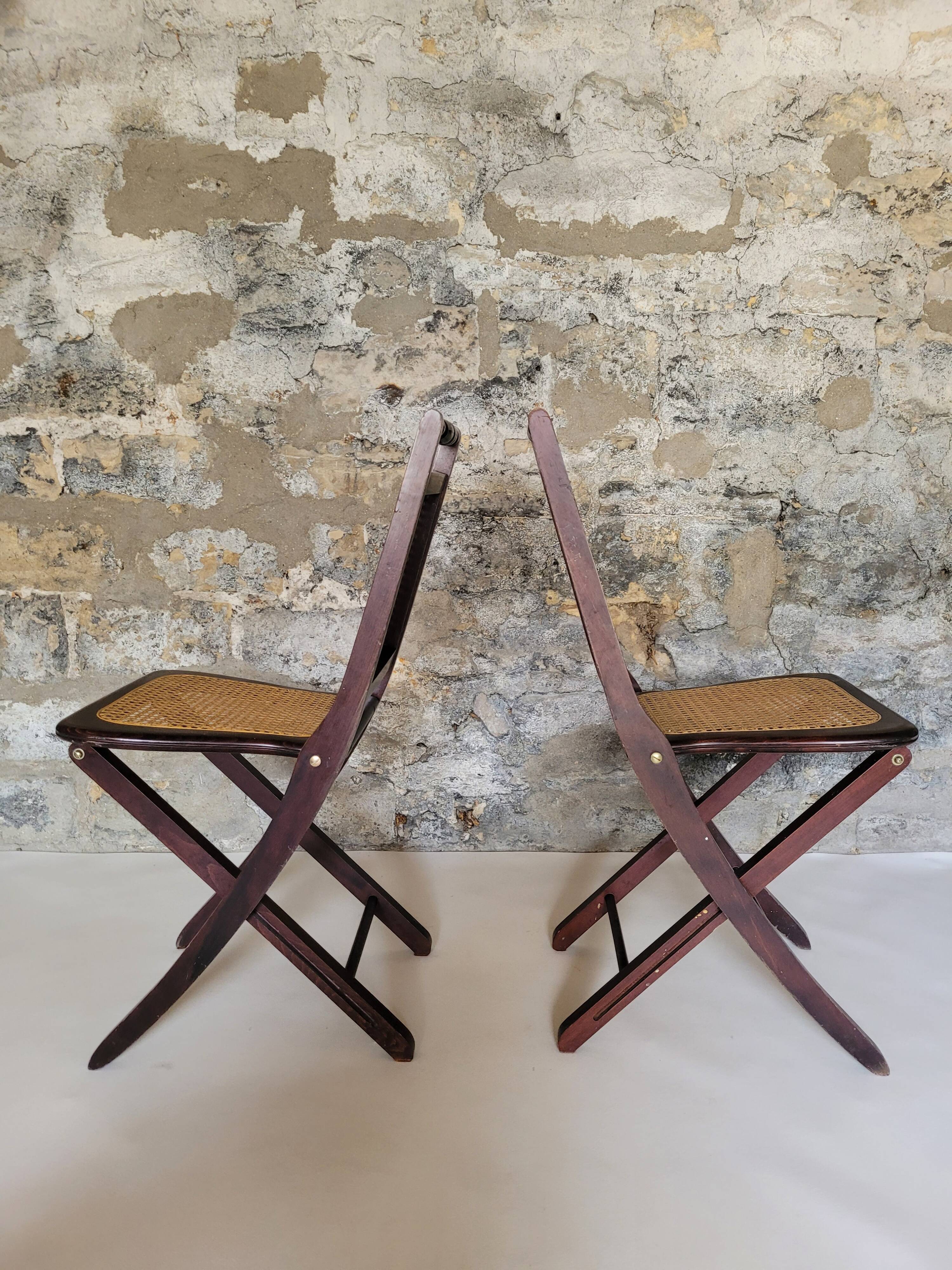 Pair of folding cane chairs