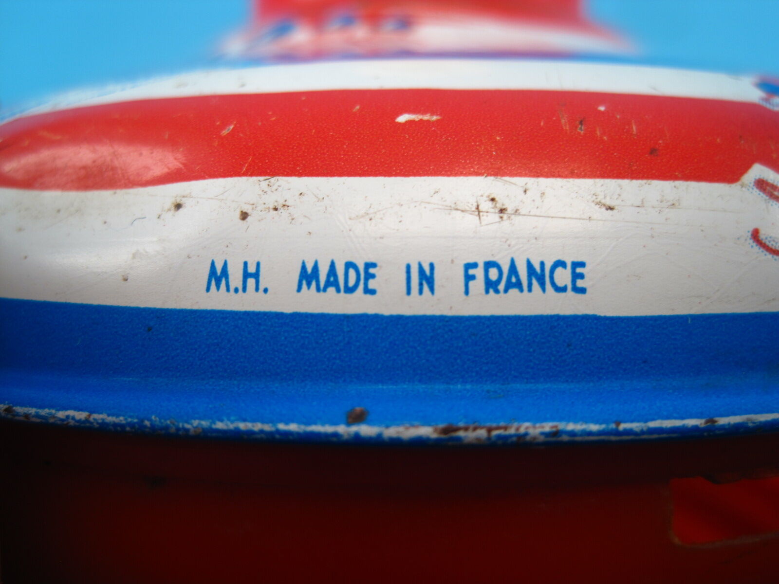 Vintage toy top M.H.
