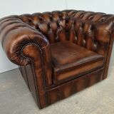 Brown leather chesterfield armchair