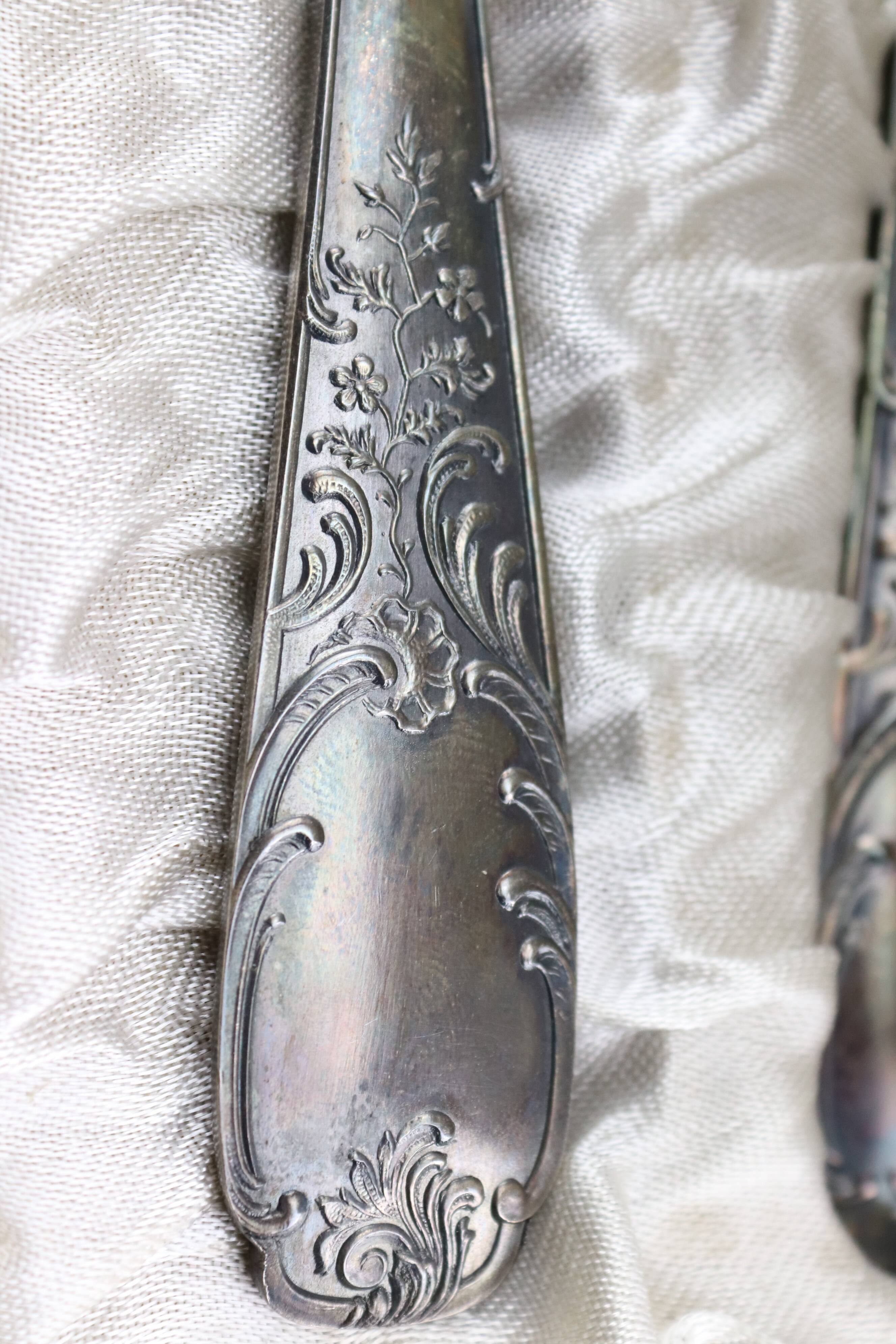 Old covered box in silver or silver metal spoon and fork with hallmarks