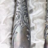 Old covered box in silver or silver metal spoon and fork with hallmarks