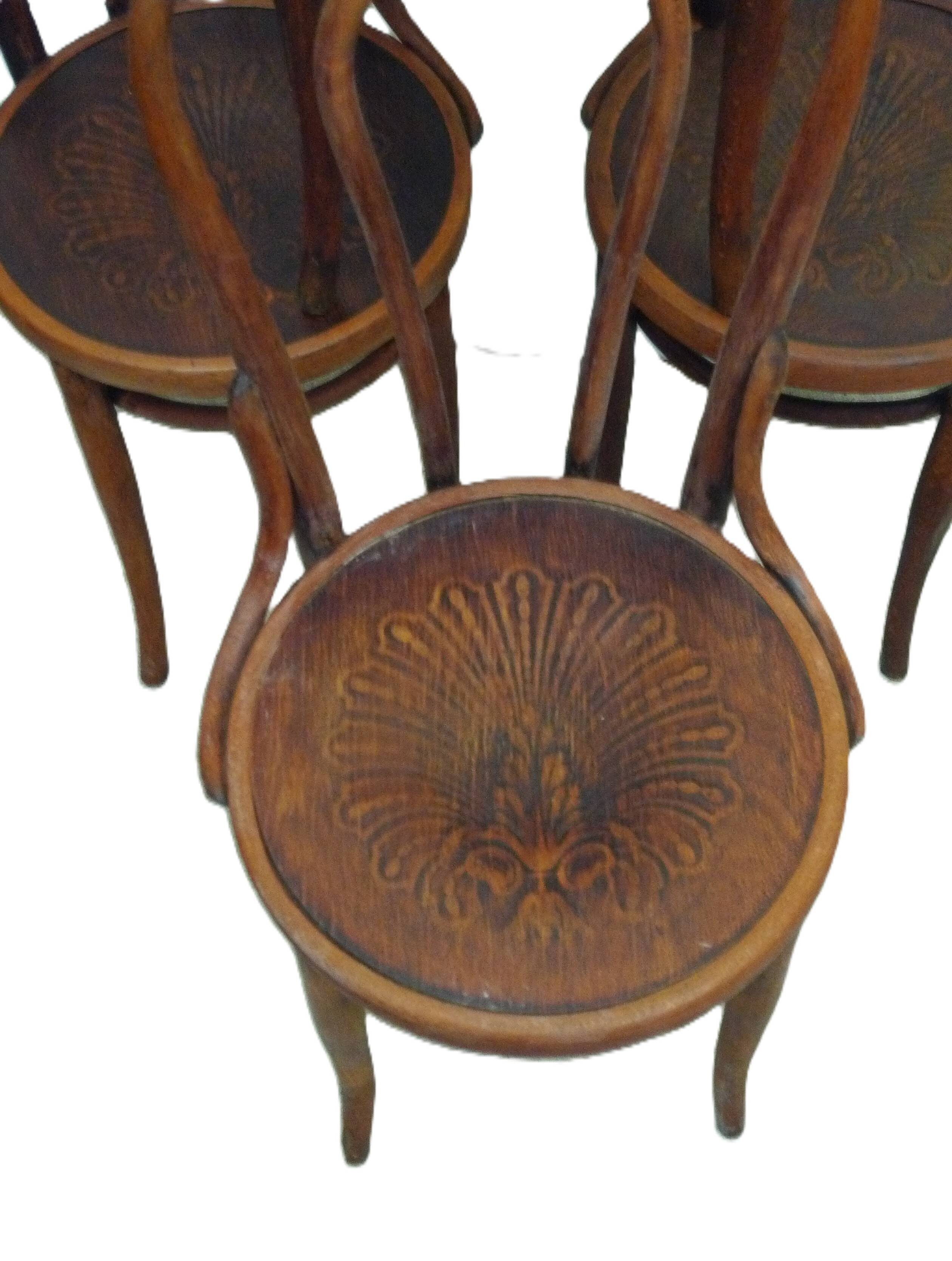 Set of four Jacob Kohn chairs.