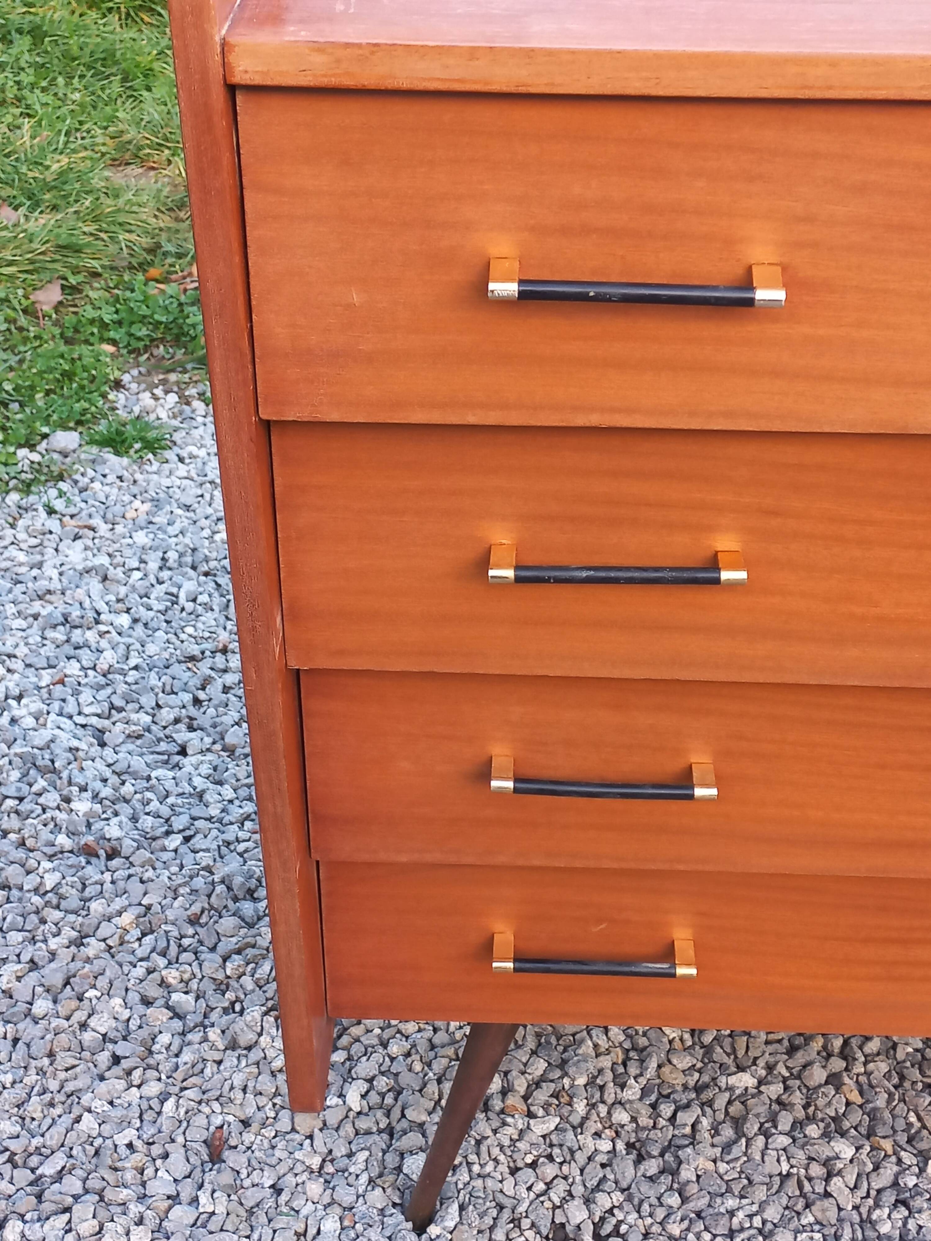 Vintage mahogany commode with metal tapered legs, 4 drawers, 1950s.