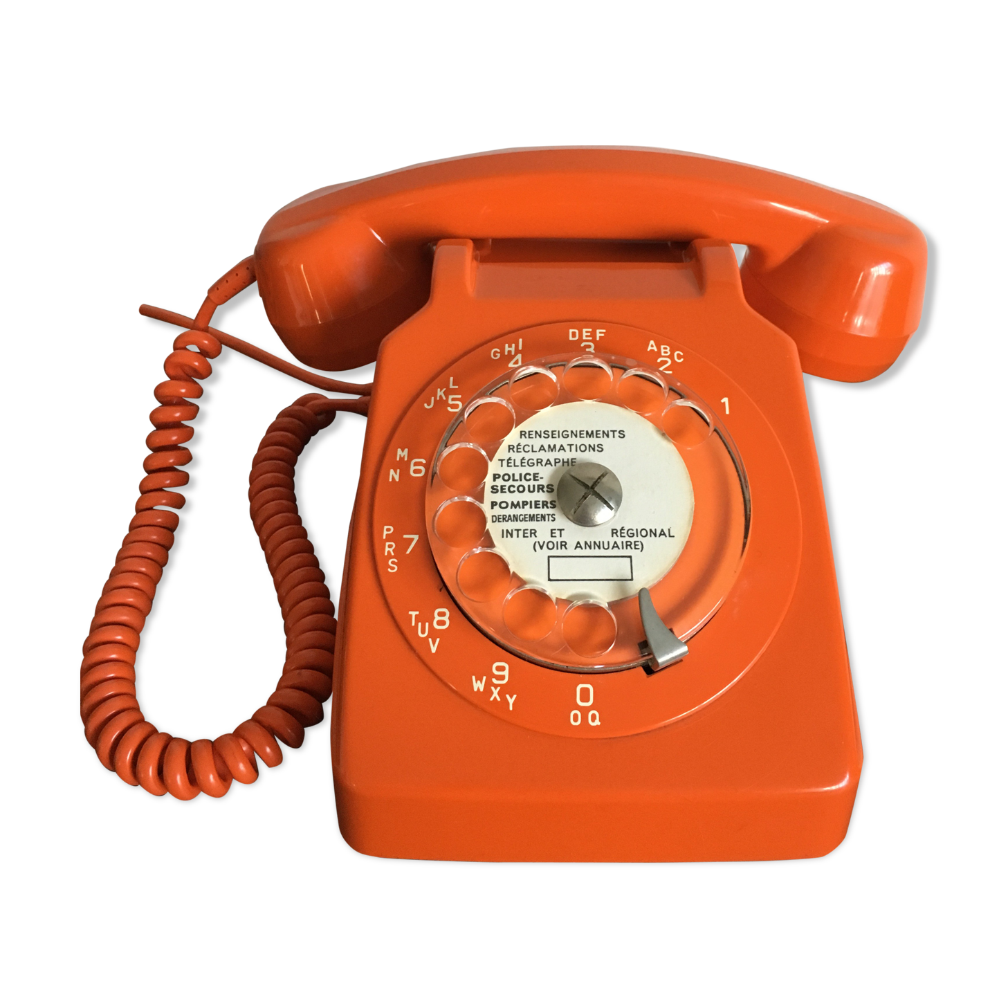 Vintage orange rotary phone