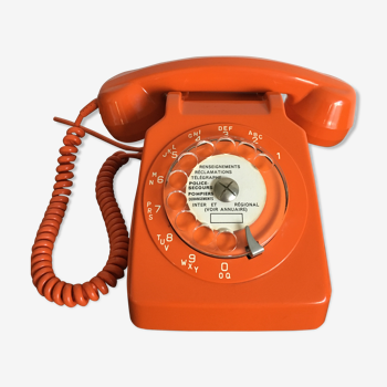 Téléphone à cadran vintage orange