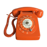 Vintage orange rotary phone