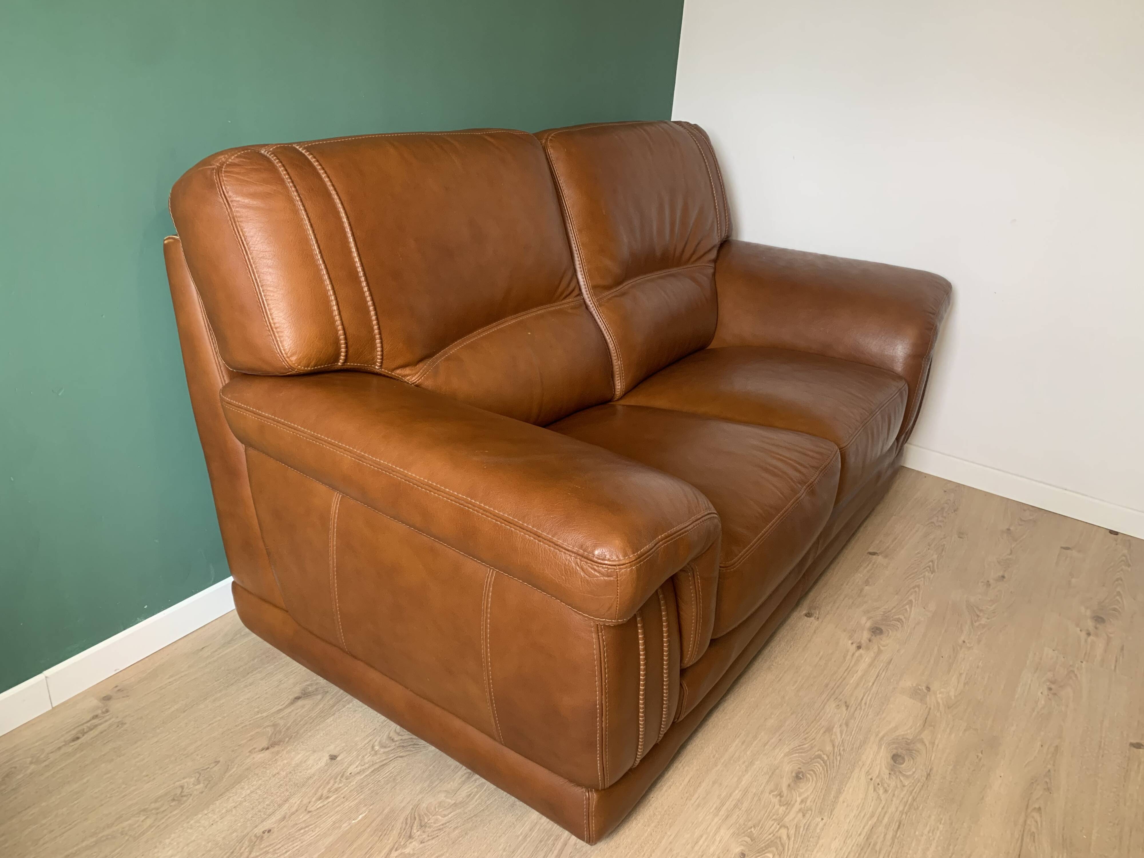 Two-seater leather sofa