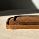 Trio of rounded rectangular trays or cups in monoxyl teak L:35