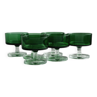6 translucent green bowls, 6 translucent green stemmed glasses.